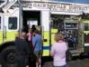 Children visit a Gainesville District Volunteer Fire Department truck.