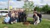 Prince William County Public Library and County guests join NOVEC representatives at the Arbor Day tree dedication.